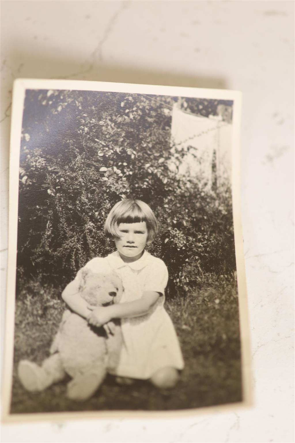 A mid 1920s Teddy Bear with photo of original owner